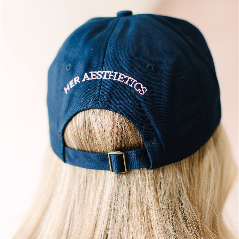 HER baseball cap
