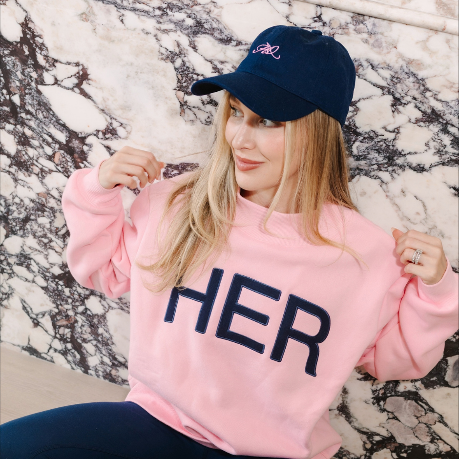 HER baseball cap